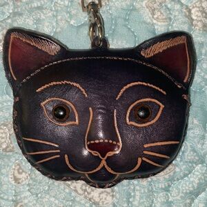 Genuine leather Cat Face Wristlet.